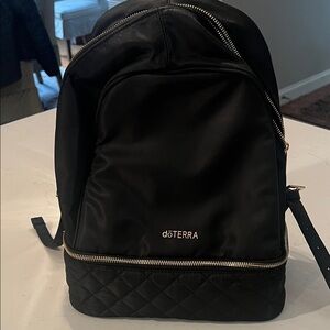 doTERRA Black Quilted Backpack with Gold Accents